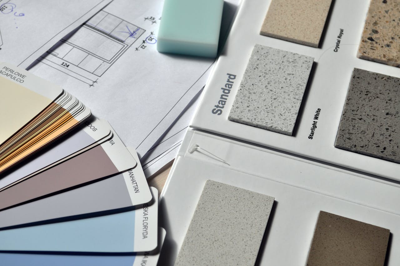 Mastering the First Impression: Your intriguing post title goes here Color palette and material samples for interior renovation projects on a blueprint.